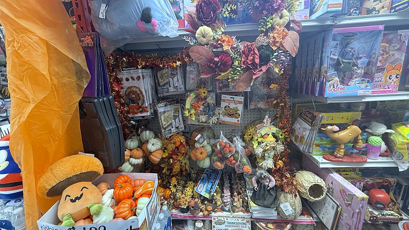 Fall and Thanksgiving display with pumpkins and wreaths