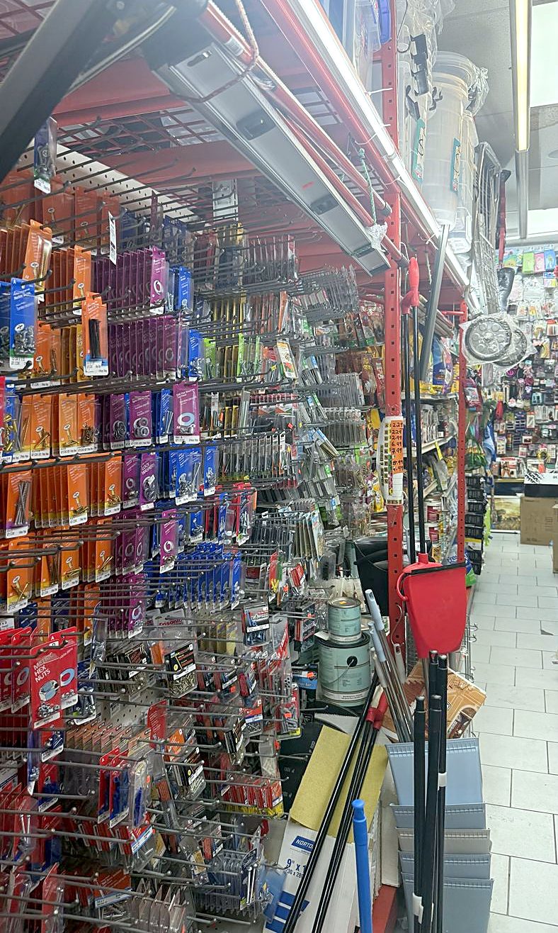 Wall of screws, washers and hex nuts